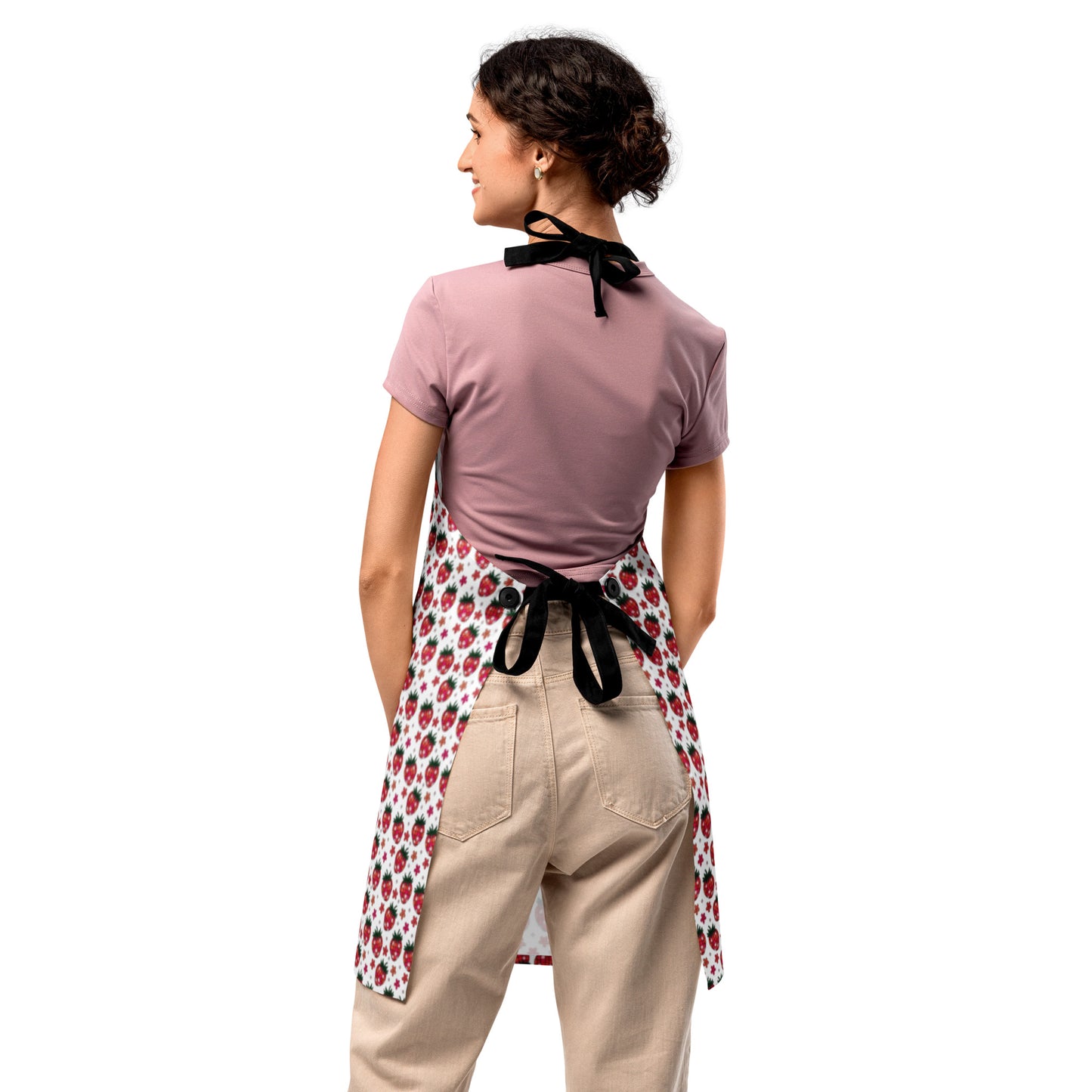Pink Disco Strawberry Fields Apron by Spinsterly Co, pink fabric with black tie straps and strawberry print
