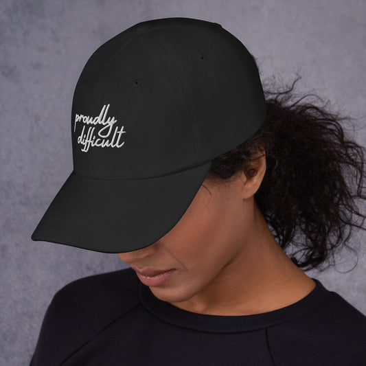 Proudly Difficult Dad Hat Feminist Embroidered Baseball Cap by Spinsterly Co in black with curved visor and stitching