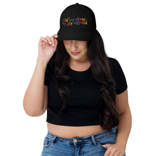 Ask Me About My Gay Agenda Trucker Hat LGBTQIA Pride Cap by Spinsterly Co in Black with embroidered text graphic