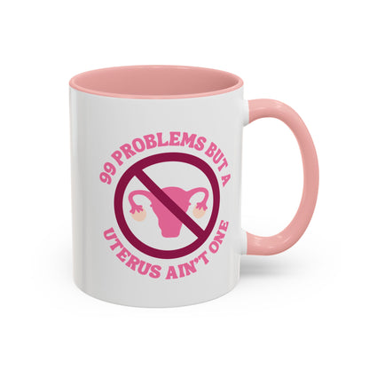 99 Problems Uterus Is Not One Accent Coffee Mug by Spinsterly Co in Pink with glossy ceramic circular badge