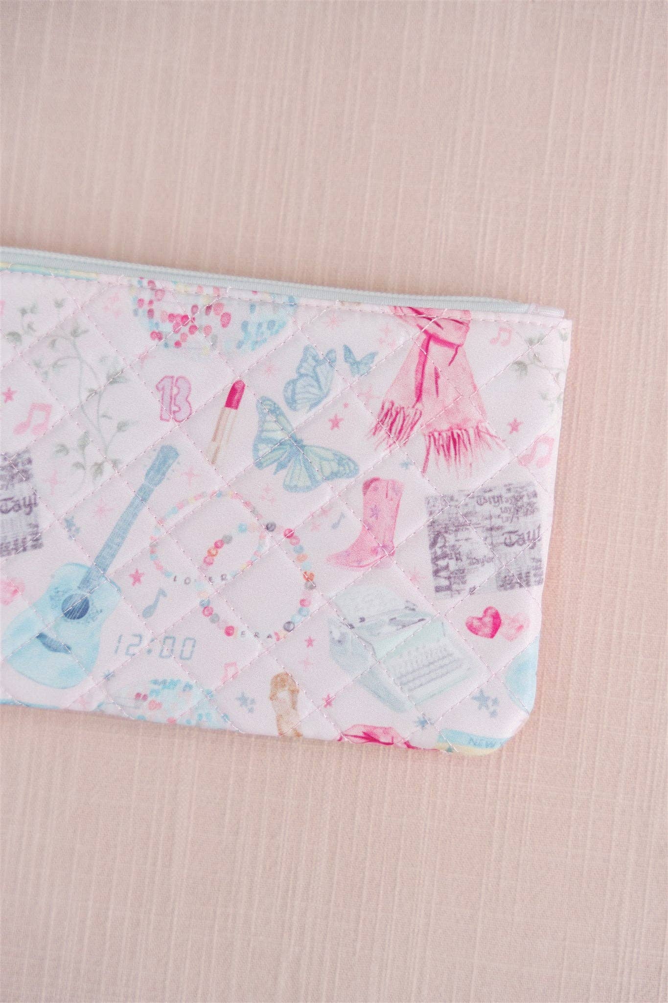 Eras Quilted Wristlet Chic Fan Art Clutch Bag by Gracefully Made, pink and blue quilted exterior with wrist strap