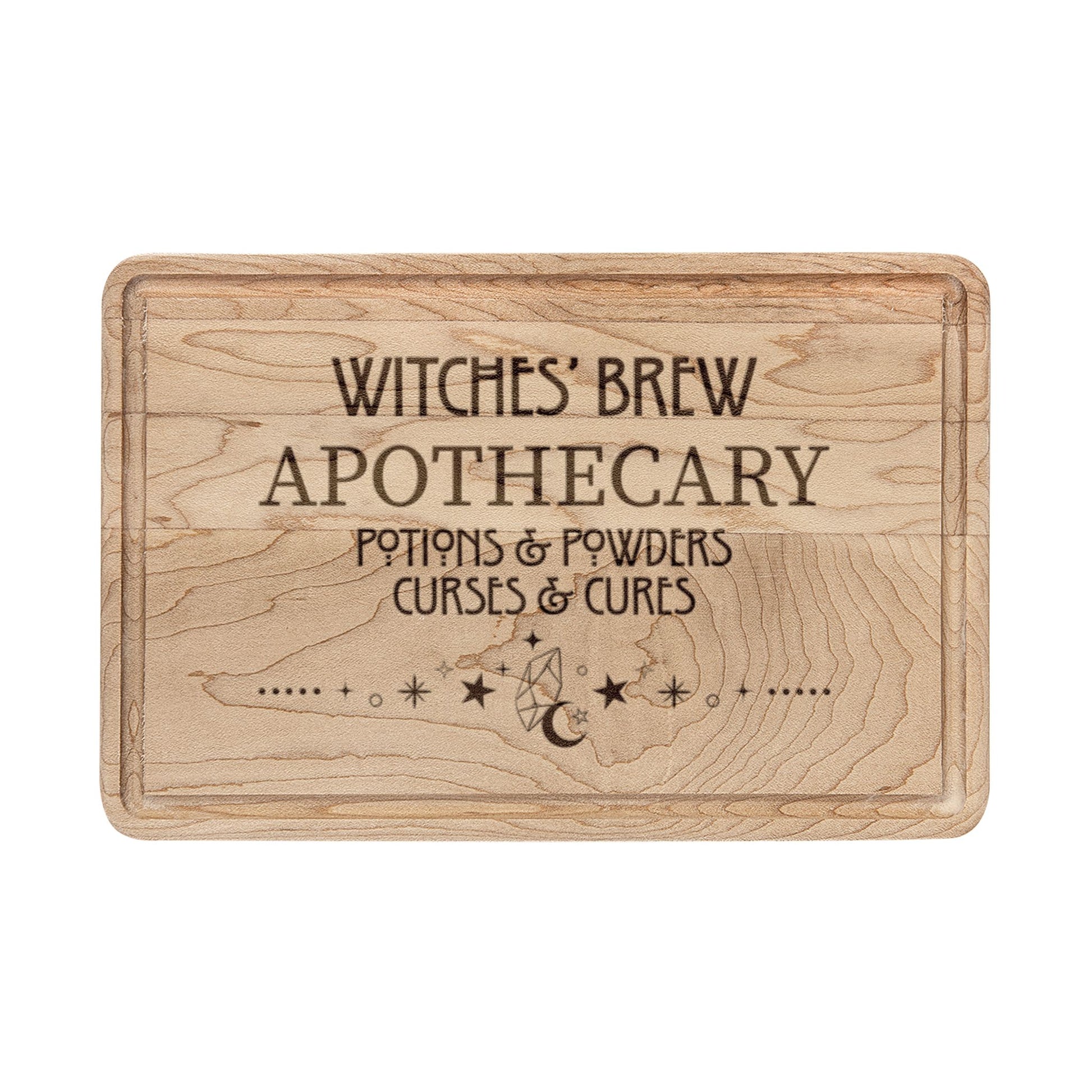 Witches' Brew Apothecary Engraved Wooden Cutting Board by Spinsterly Co in Walnut with drip ring and carved text