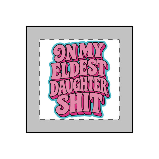 A square graphic print with the phrase 'ON MY ELDEST DAUGHTER SHIT' in bold pink bubble letters with a bright cyan outline, centered on a white background with a dashed border, surrounded by a gray square frame.