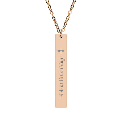 Violent Little Thing Dragon Engraved Vertical Bar Necklace by Spinsterly Co in black PVD coating with dragon silhouette