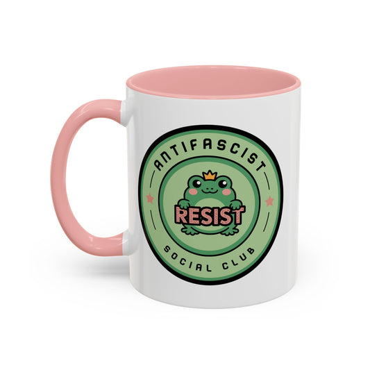 Antifascist Social Club Resist Accent Coffee Mug Kawaii Frog Political Mug Spinsterly Co Pink with crowned RESIST badge