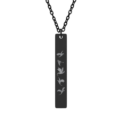 Five Dragons in Flight Engraved Vertical Bar Necklace by Spinsterly Co, black PVD bar with five dragon silhouettes