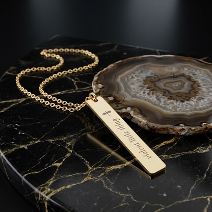 Violent Little Thing Dragon Engraved Vertical Bar Necklace by Spinsterly Co in 18K Gold PVD with dragon silhouette