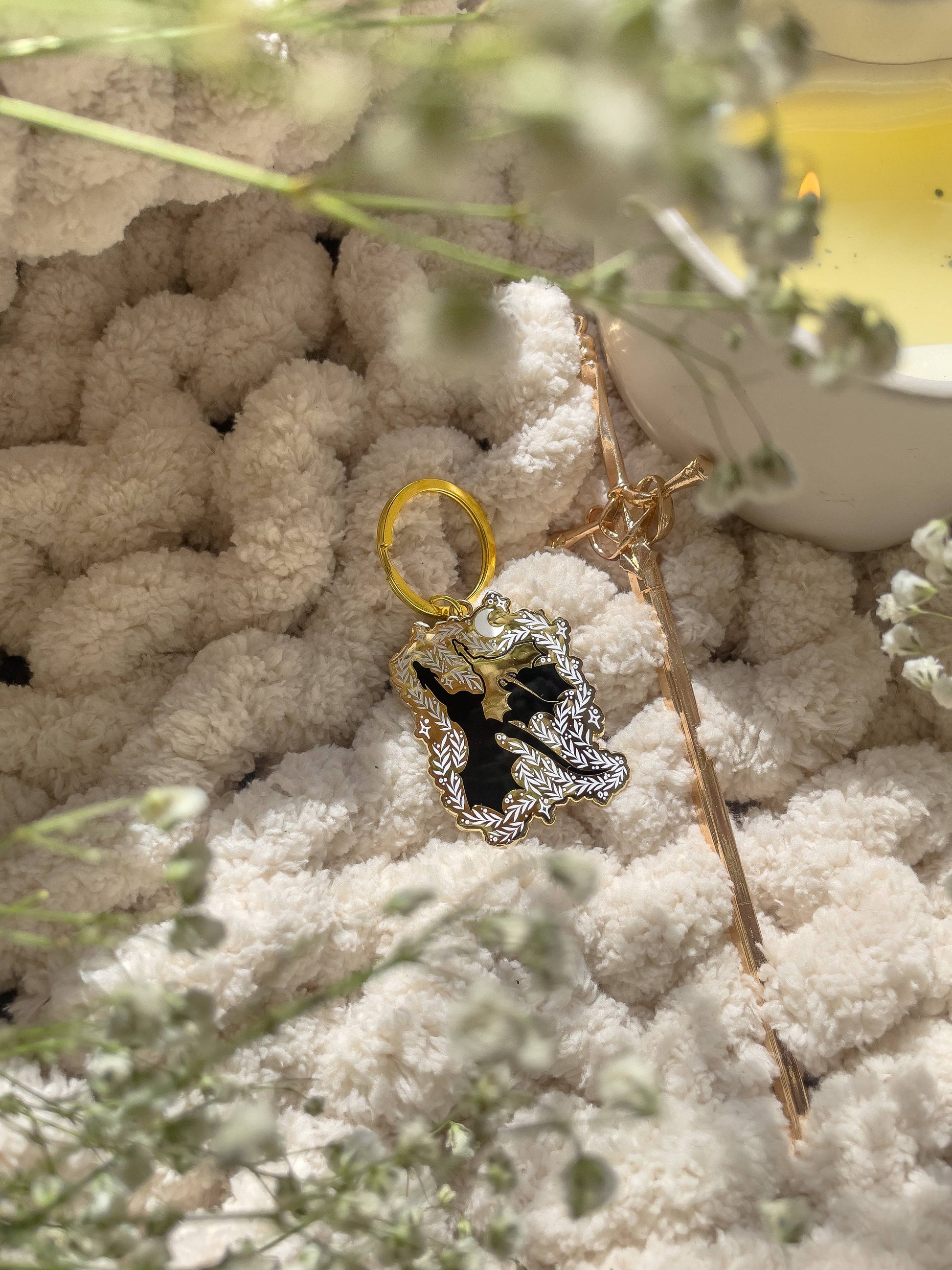 Dragon Bonded Pair Keychain Hard Enamel Fantasy Fan Art by Meaggie Moos, gold accents on a white plush background
