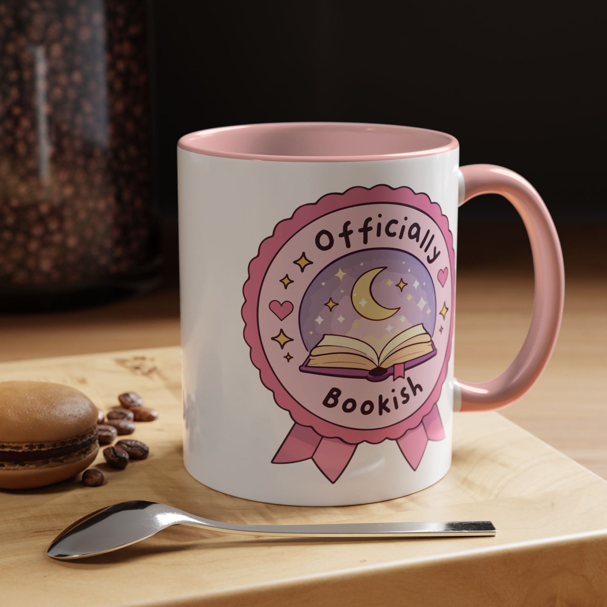 Officially Bookish Accent Coffee Mug Pink Interior Spinsterly Co ceramic mug with rosette badge graphic