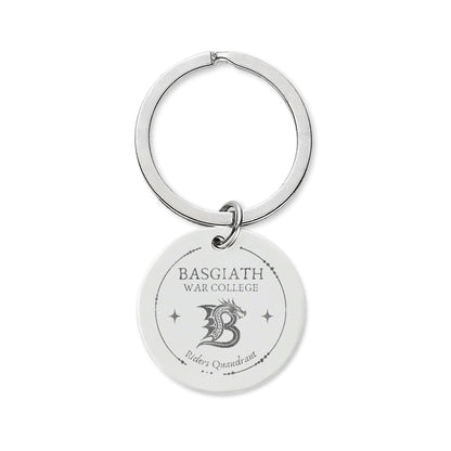 A silver metal keychain featuring a round disc charm engraved with 'BASGIATH WAR COLLEGE', a stylized dragon emblem, and 'Riders Quindecim' on a plain white background.