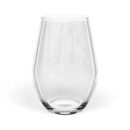 Clear glass stemless wine glass on a white background