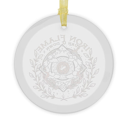 A round clear ceramic ornament featuring the backside of a crystal ornament hanging from a gold ribbon on a clear background.