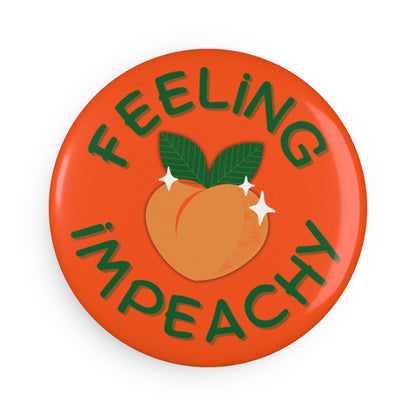 Feeling Impeachy Button Magnet by Spinsterly Co round fridge magnet in orange with glossy mylar UV cover