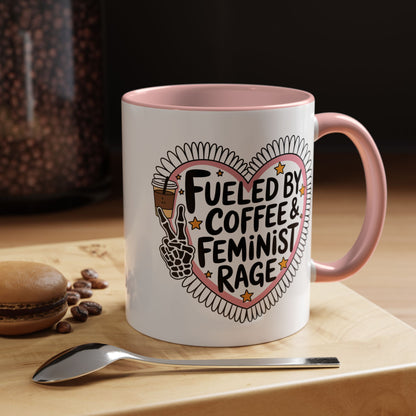 Fueled by Coffee Feminist Rage Accent Coffee Mug by Spinsterly Co, pink glossy ceramic with daisy-edged heart