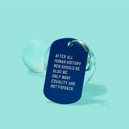 Blue keychain with white text on a light blue background