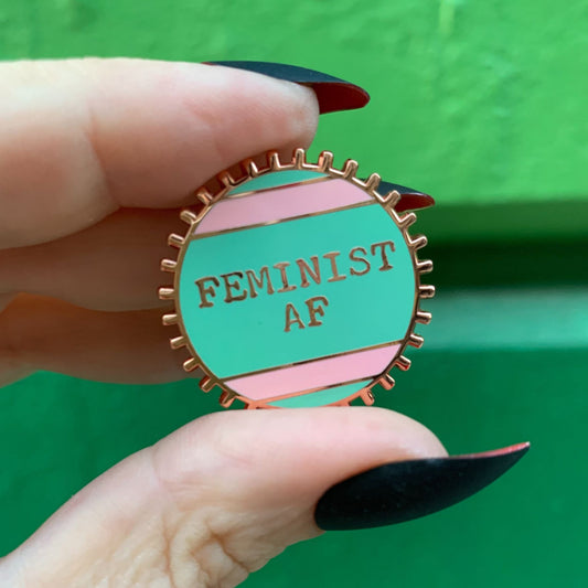 Feminist AF Enamel Pin by The Bullish Store, pink and green stripes wheel pin with metal backing