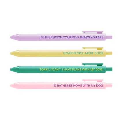 Five pens with humorous quotes about dogs on a white background