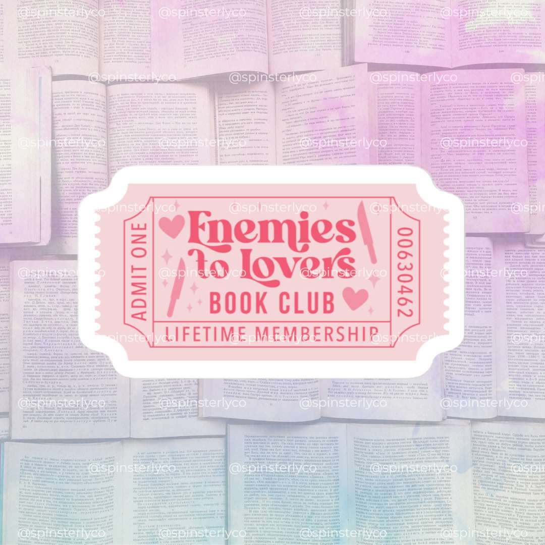 A pink and white ticket-style graphic reading 'Enemies to Lovers Book Club Lifetime Membership' centered over a soft pastel background of stacked open books.