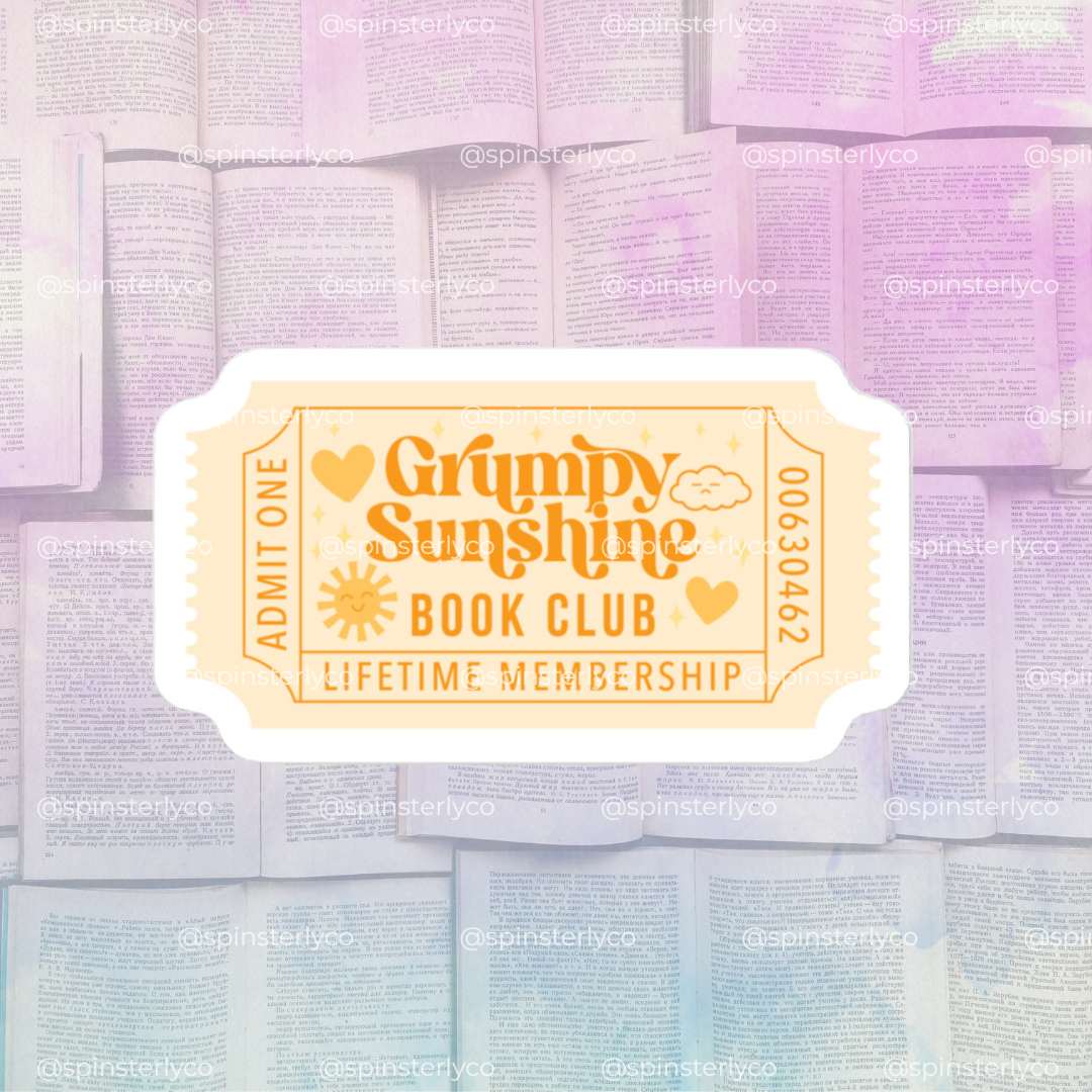 A retro-style ticket graphic reading 'Grumpy Sunshine Book Club Lifetime Membership' with heart icons and a sun, centered over a pastel background of open books.