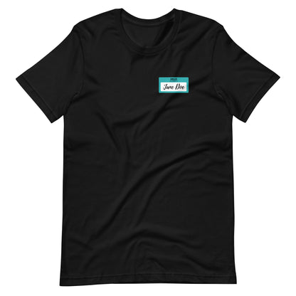 Black t-shirt with a graphic over the left chest, imitating a name tag that says "Hello My Name is Jane Doe" a white background