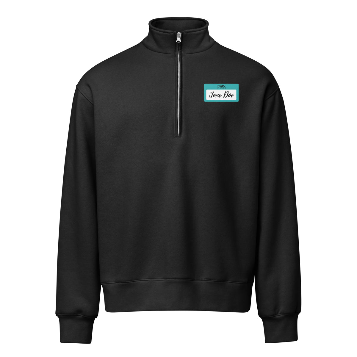 A black quarter-zip sweatshirt with a square graphic of a name sticker that reads "Hello My Name is Jane Doe, in support of survivors of sexual violence on the left chest, displayed on a clean white background.