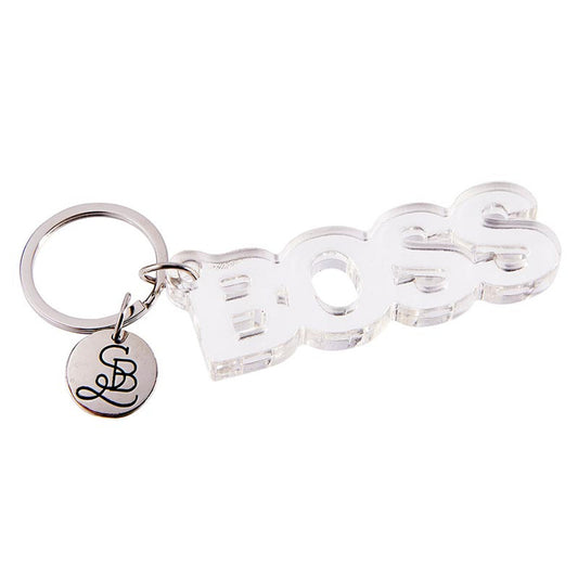 Keychain with 'BOSS' letters and a small round charm on a white background