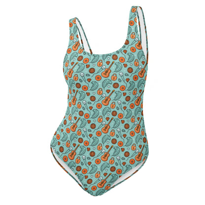 Showgirl Era One-Piece Swimsuit by Spinsterly Co in light teal with all-over guitar and disco print