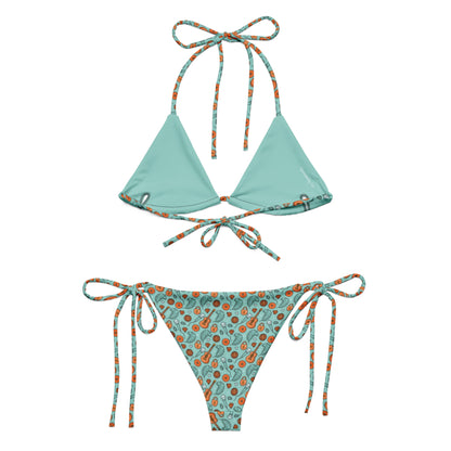 Showgirl Era String Bikini by Spinsterly Co in teal with all-over print and tie string sides