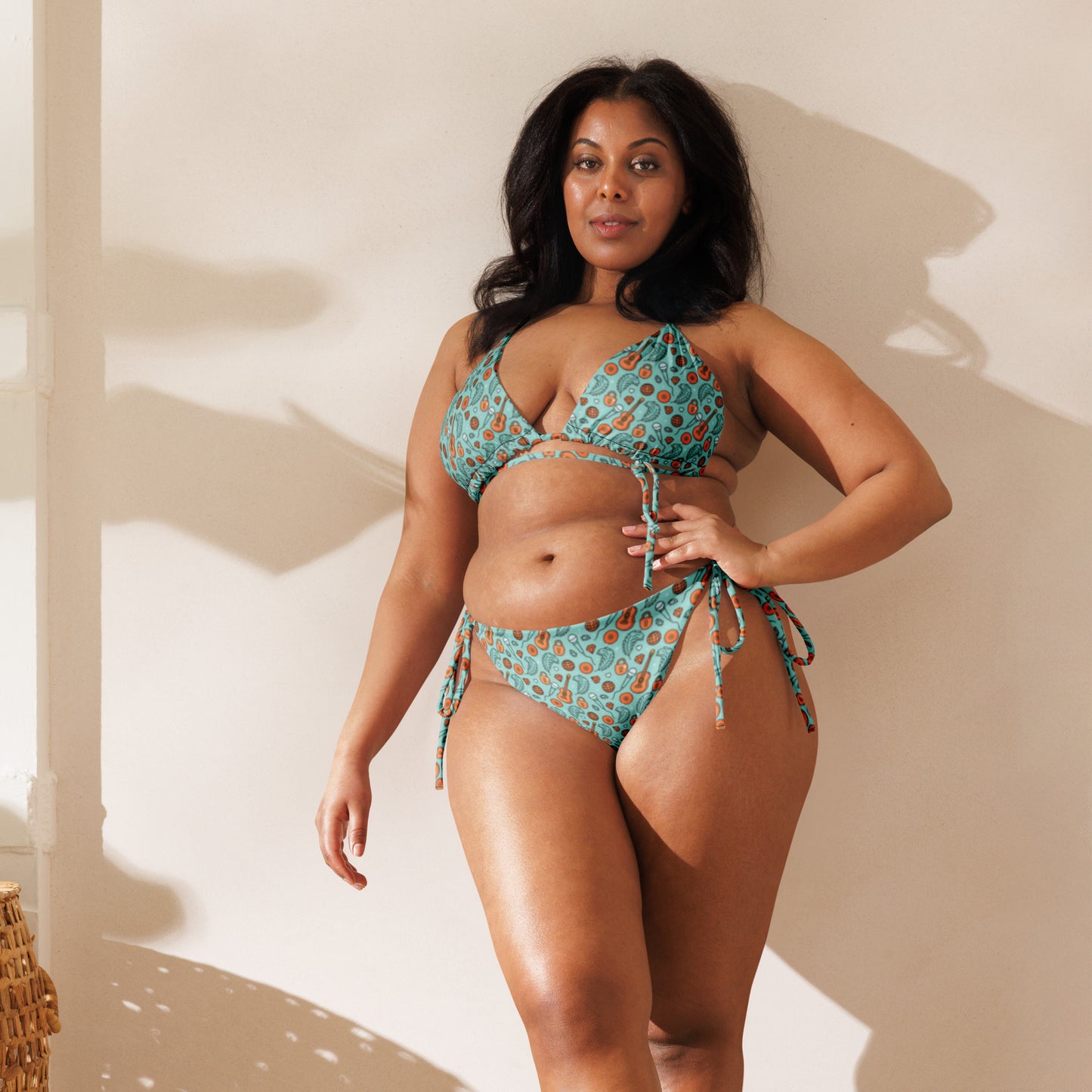 Showgirl Era String Bikini by Spinsterly Co in teal all-over print with tie side bottoms