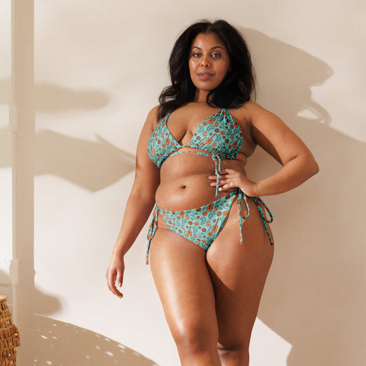 Showgirl Era String Bikini by Spinsterly Co in teal all-over print with tie side bottoms