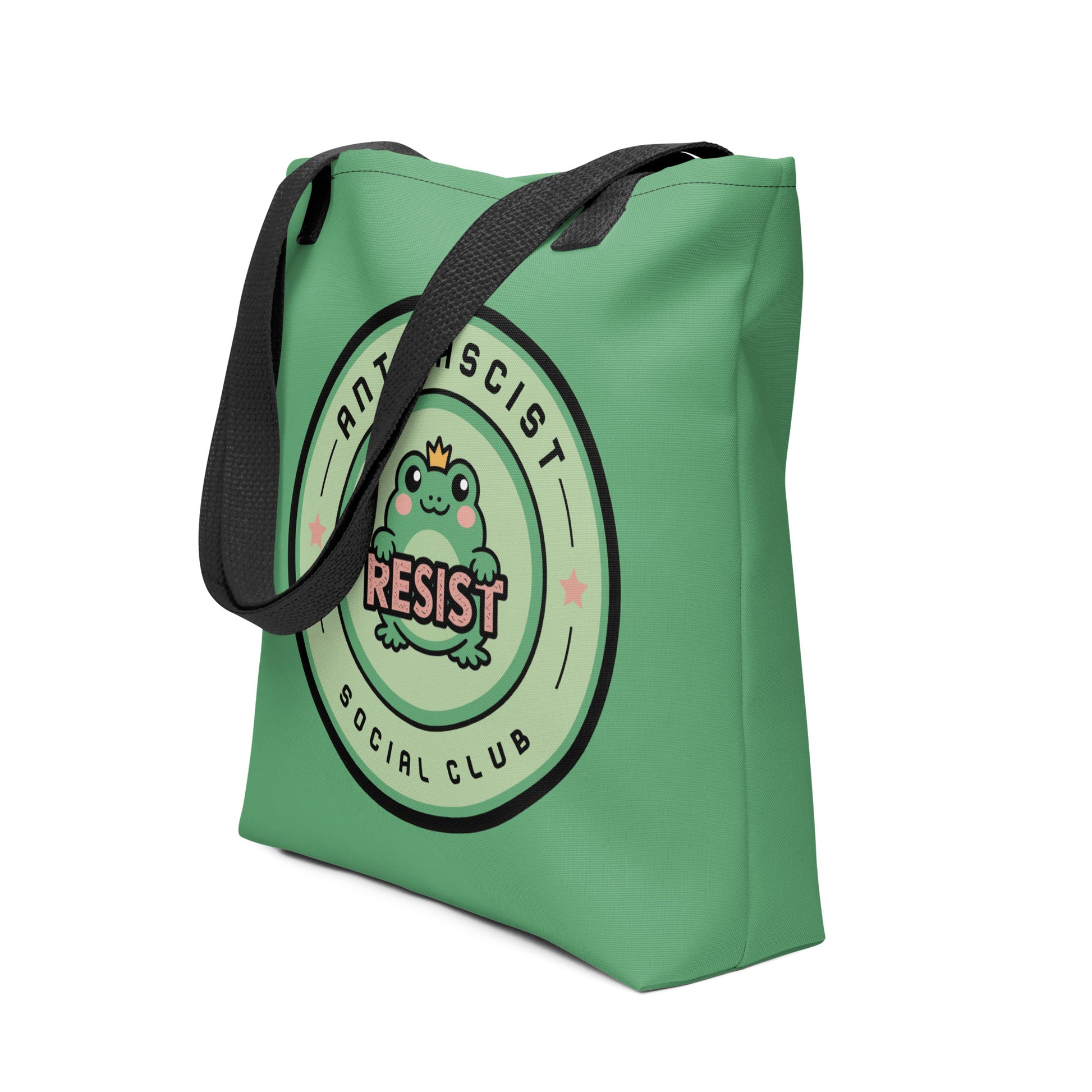 Sage green Antifascist Social Club tote bag with a cute crowned frog badge and bold red RESIST text