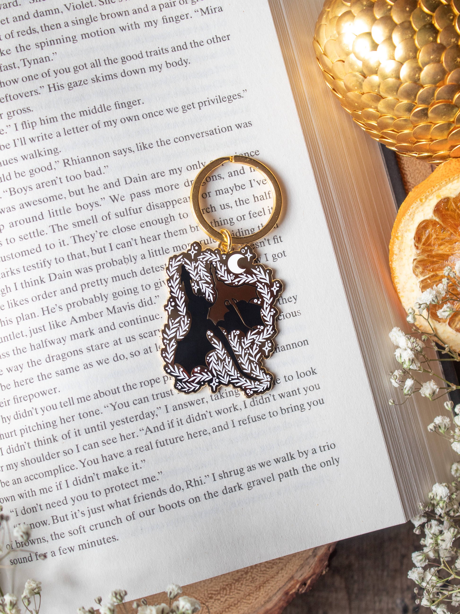Dragon Bonded Pair Keychain Hard Enamel Fantasy Fan Art by Meaggie Moos in black and gold