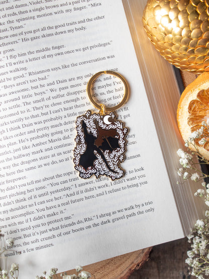 Dragon Bonded Pair Keychain Hard Enamel Fantasy Fan Art by Meaggie Moos in black and gold