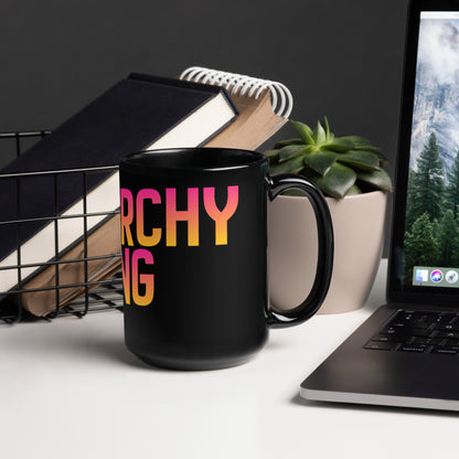 Matriarchy Rising Sunrise Feminist Statement Mug by Spinsterly Co in glossy black with sunrise graphic on both sides