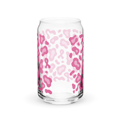 A clear glass can-shaped tumbler with a pink and light pink leopard print pattern, shown on a clean white background.