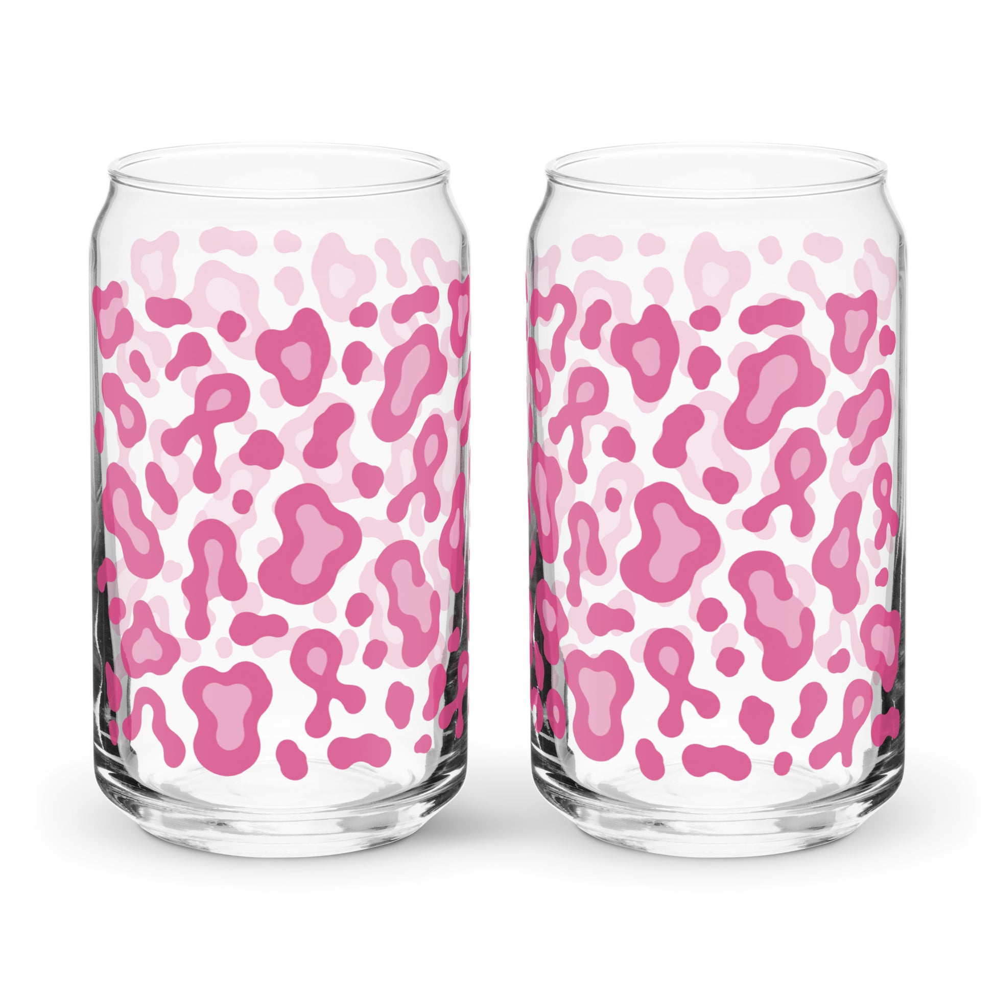 Two clear glass can-shaped tumblers with a pink and light pink leopard print pattern, shown side-by-side on a white background.