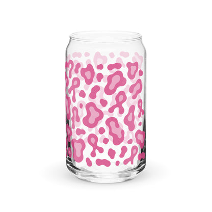A clear glass can-shaped tumbler with a pink and light pink leopard print pattern, shown on a clean white background.