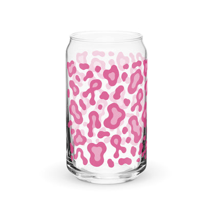 A clear glass can-shaped tumbler with a pink and light pink leopard print pattern, shown on a clean white background.