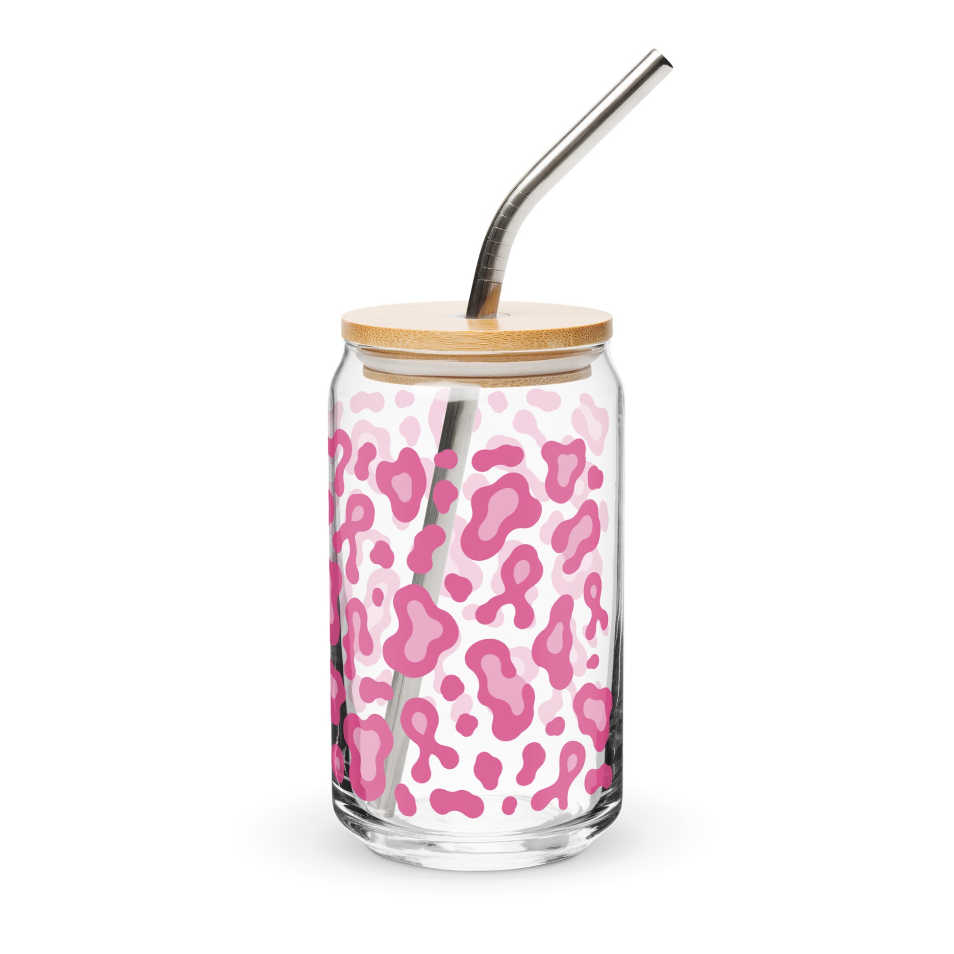 A clear glass can-shaped tumbler with a pink leopard print pattern, a light wood lid, and a curved stainless steel straw, shown on a white background.
