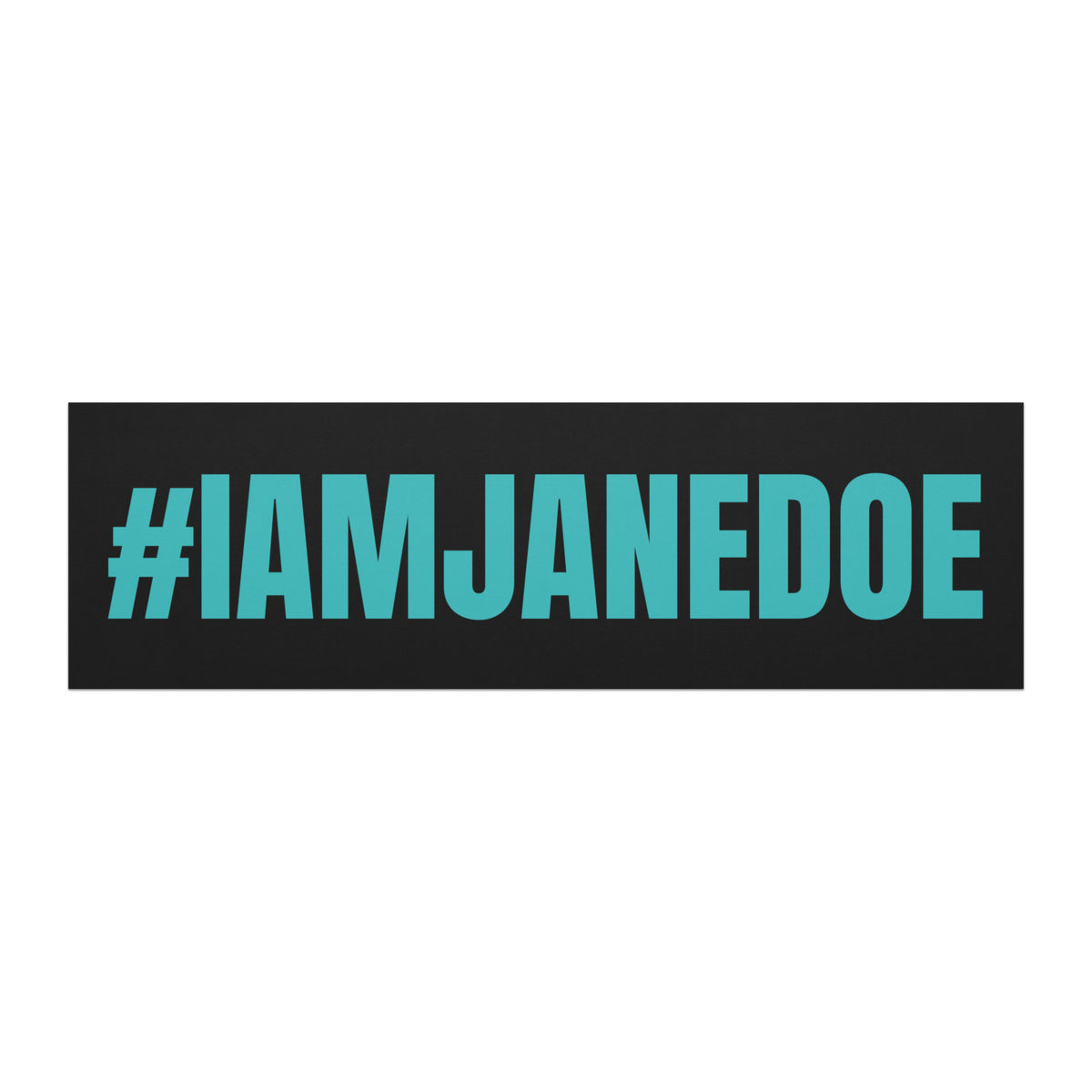 A rectangular black bumper sticker or sign with the text '#IAMJANEDOE' in bold turquoise lettering, shown on a plain white background.
