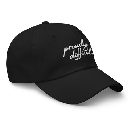 Proudly Difficult Dad Hat Feminist Embroidered Baseball Cap by Spinsterly Co in black with white embroidered text