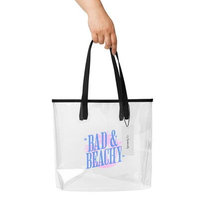 Bad Beachy Clear Tote Bag by Spinsterly Co with black straps and transparent waterproof TPU design