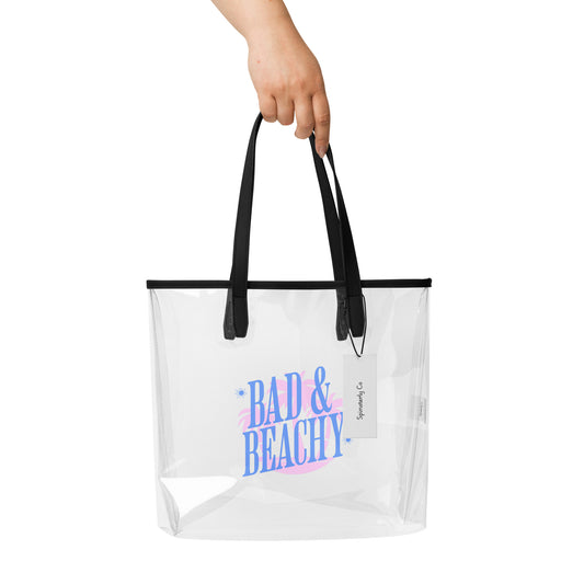 Bad Beachy Clear Tote Bag by Spinsterly Co with black straps and transparent waterproof TPU design