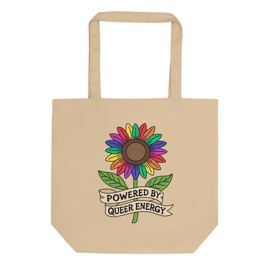 Powered by Queer Energy Eco Tote Bag by Spinsterly Co in beige with rainbow sunflower graphic and ribbon