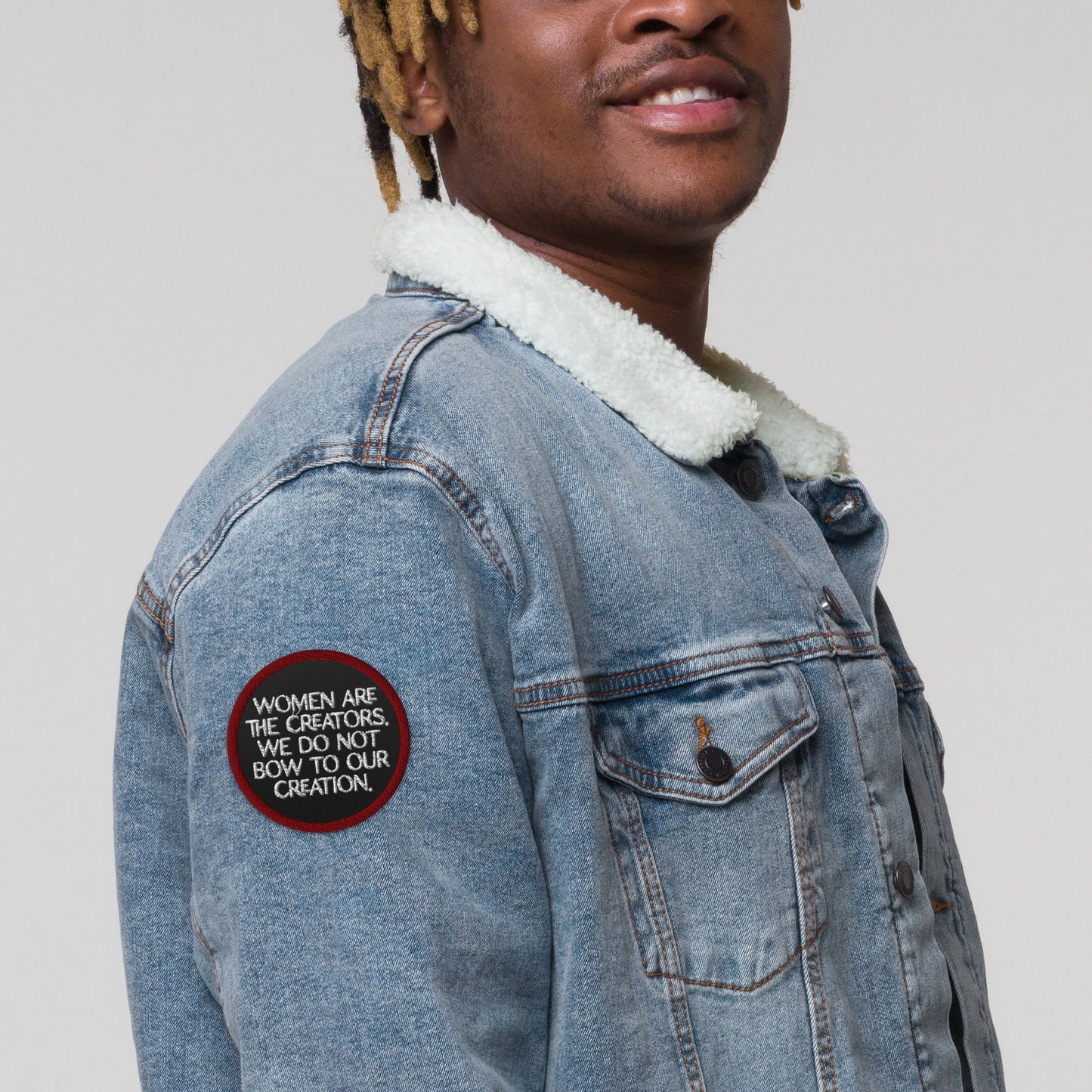 Women Are The Creators Embroidered Patch by Spinsterly Co, circular twill patch with red border and white text