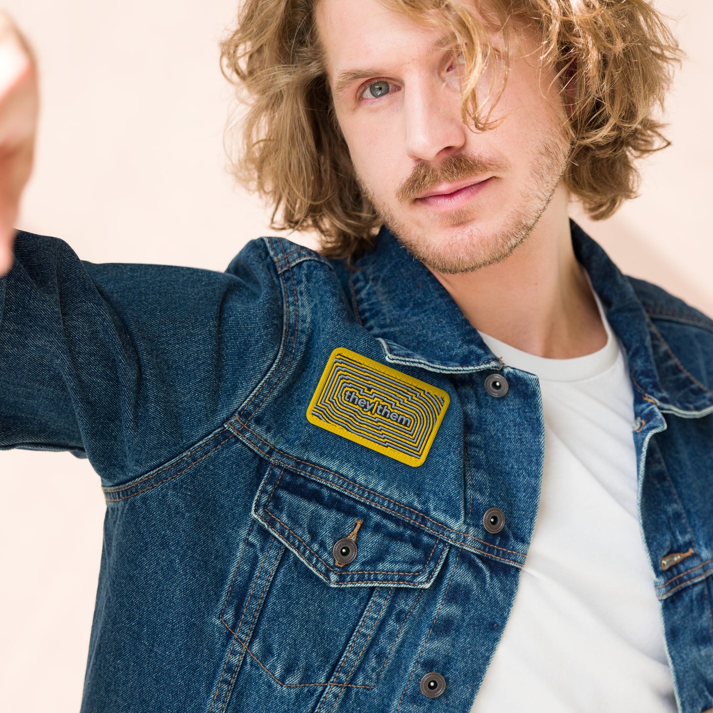 TheyThem Pronoun Embroidered Patch by Spinsterly Co, yellow twill geometric iron-on patch on denim jacket