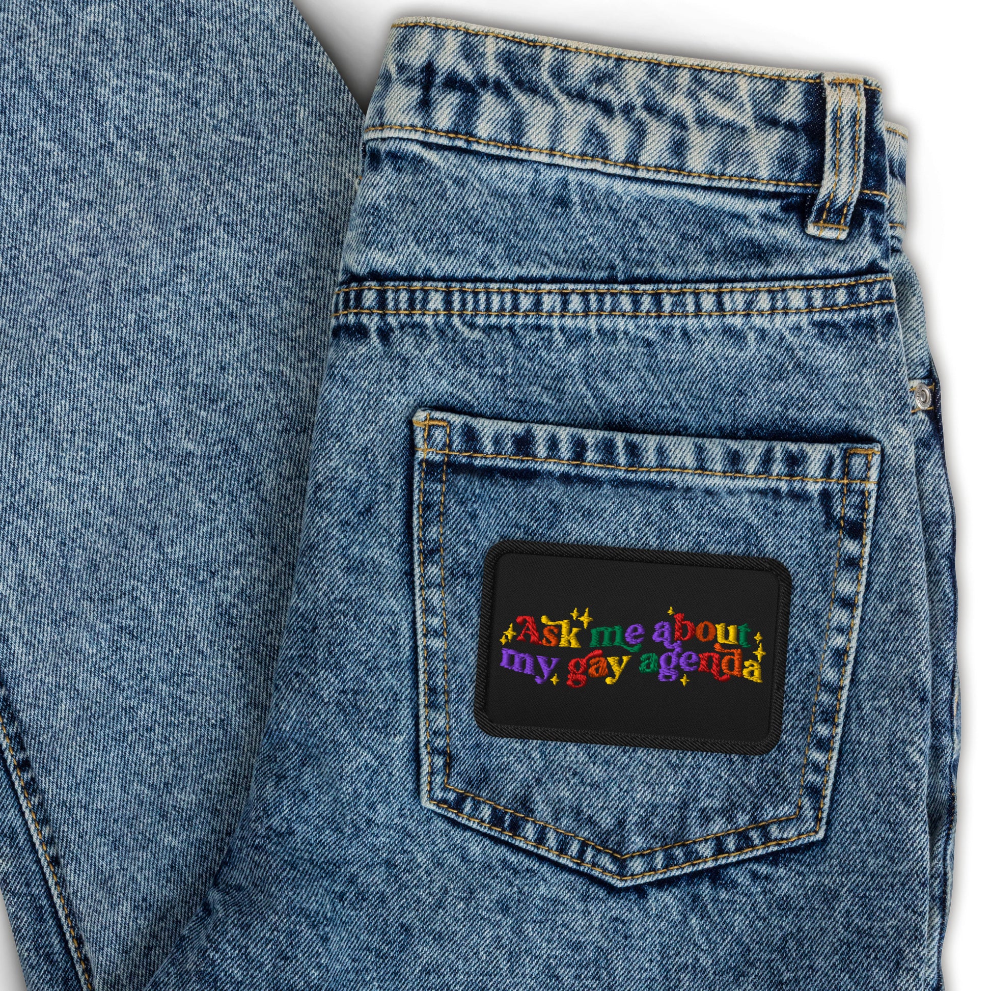 Ask Me About My Gay Agenda Embroidered Patch by Spinsterly Co, black 3 inch conversation patch on denim