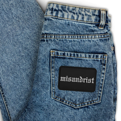 Misandrist Embroidered Iron-On Patch Gothic Feminist Accessory by Spinsterly Co in blue denim with stitched design