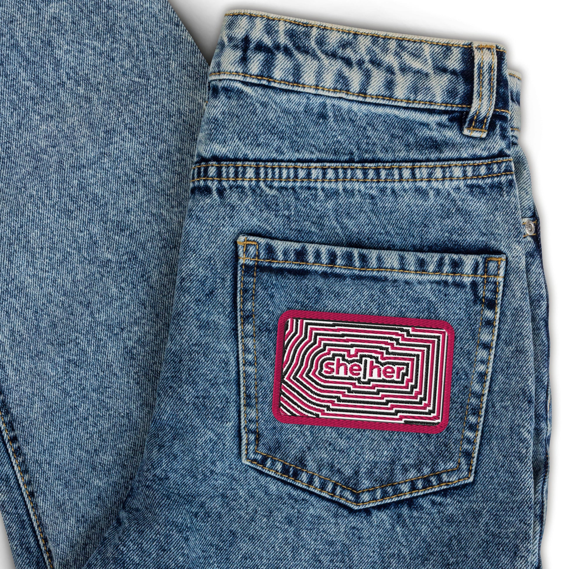 SheHer Pronoun Embroidered Patch Spinsterly Co LGBTQIA accessory on blue denim, geometric twill design