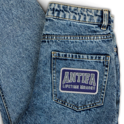Antifa Lifetime Member Embroidered Iron-On Patch Activist Accessory Spinsterly Co on blue denim jacket